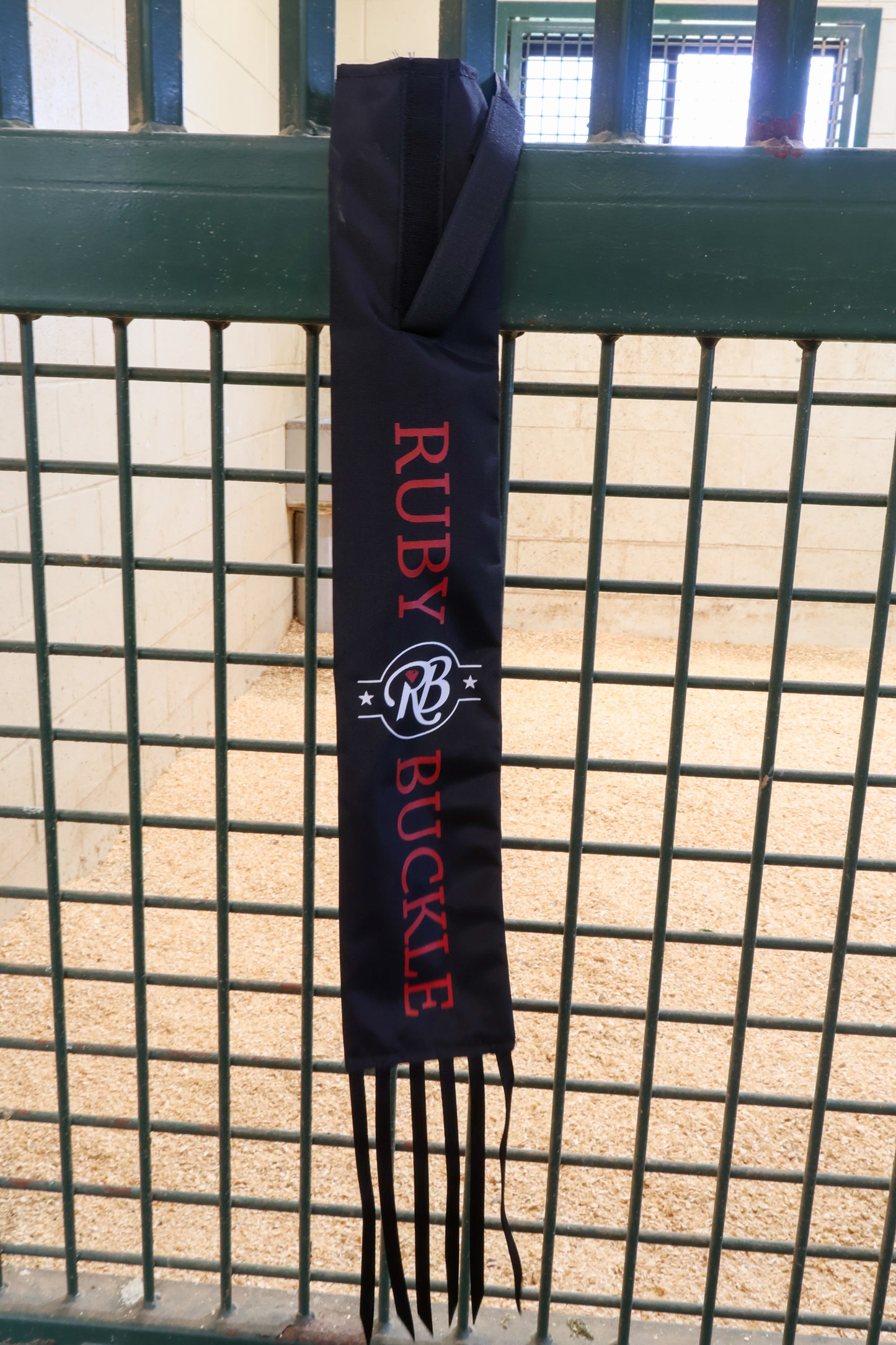 Ruby Buckle Tail Bag